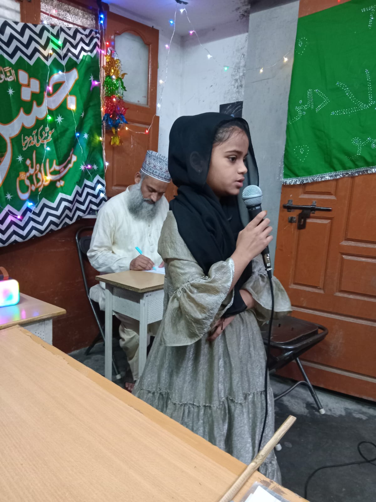 Student Delivering Speech during Eid Milad-un-Nabi